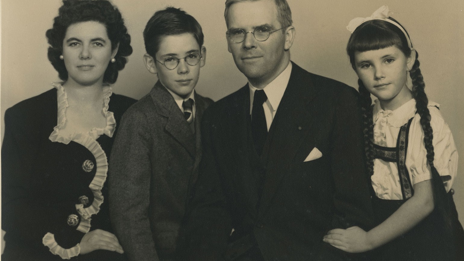 Sharp family portrait. From left: Martha Sharp, Hastings Sharp, Waitstill Sharp, and Martha Content Sharp, 1947. Photo courtesy of Sharp Family Archives.