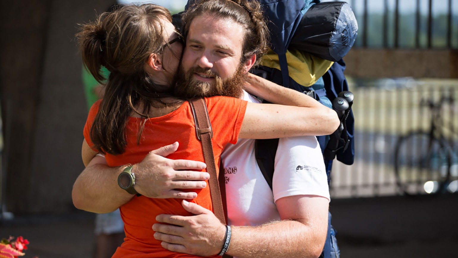 Tom Voss being given a warm welcome after completing his 2,700 mile trek across America. Photo courtesy of Michael Collins.